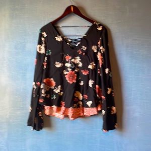 V neck front , long sleeve blouse with lacing, v neck blouse in back